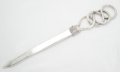 Letter opener with perforated circles