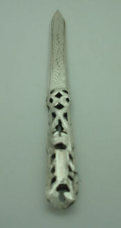 Soaked letter opener with figuras