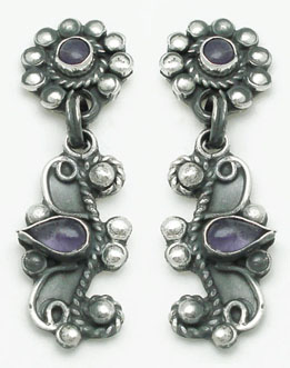Earrings and  circle with stone and curl