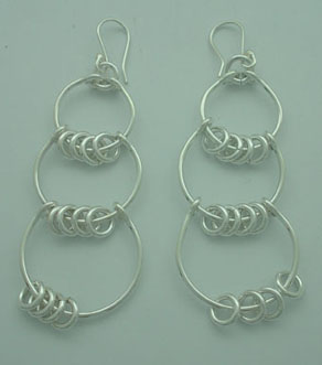 Circle earrings connected with rings