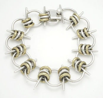 Bracelet horseshoe with 3 hoops and brass