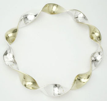 Bracelet hoops of brass and silver twisteds
