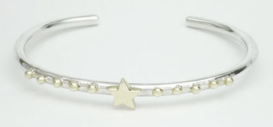 Bracelet  tube with spheres and it covers with stars in brass