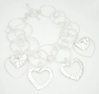Bracelet inserted hoops and hammered hearts