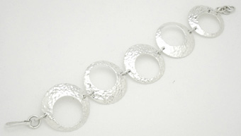 Bracelet of hammered and perforated circles
