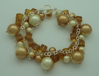Bracelet of pearls and combined glazing brown and beige