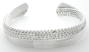 Bracelet of wire and cord interlaced