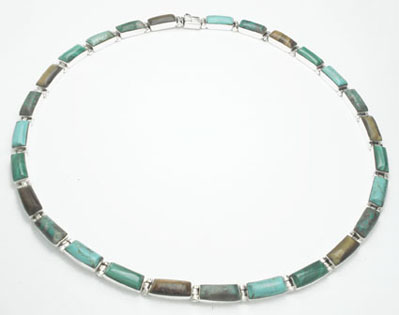 Necklace of multicolored rectangles with stones