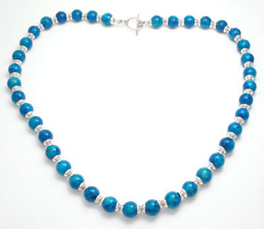 Necklace comes up sphere with turquoise balls