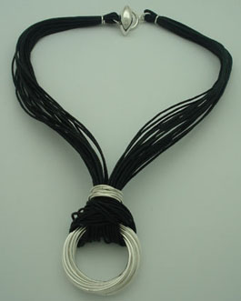 Necklace of hoops linked with black threads