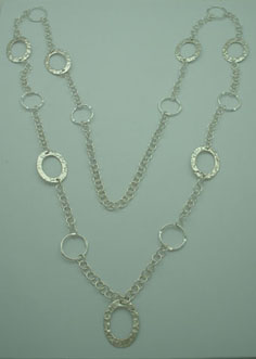 Necklace of hammered hollow ovals