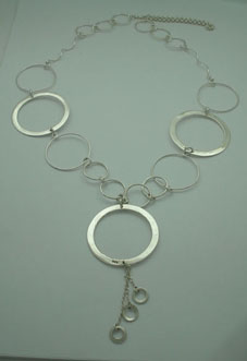 Necklace of circles of wire and smooth with spiral