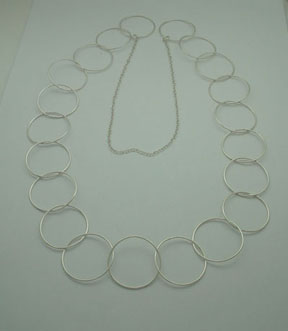 Necklace of 21 ring with a part of chain delaga.