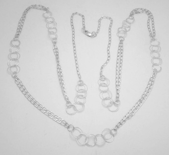 Chain necklace with rings interlaced cord and smooth