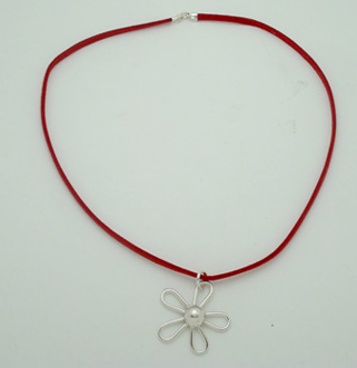 Necklace of red deerskin with flower earring with sphere
