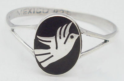 Ring with black queen oval with bird