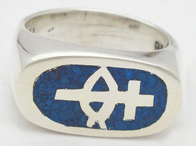 Ring of blue resin in rectangle with cross