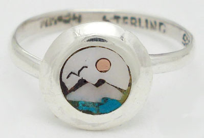 Ring with shell scenery in circle