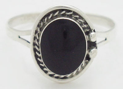 Ring of black resin in vertical oval