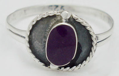 Ring with  oval  of blue resin and torsal