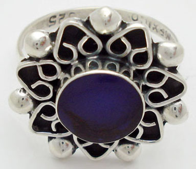 Flower ring with round purple plastic