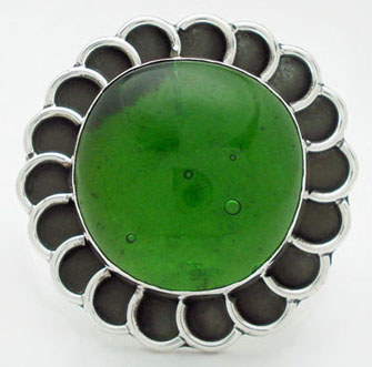 Ring in flower with glass green