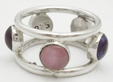 Ring with 5 stones of two-color plastic
