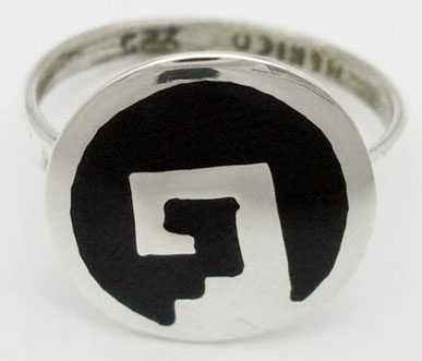 Ring with black and Greek resin in circle