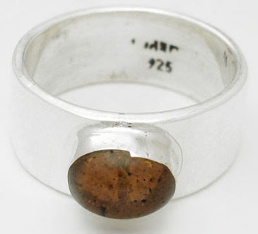 Resin ring brown in oval
