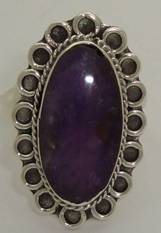 Oval ring with cord in flower with amethyst