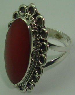 Oval ring with cord in flower with cornelian