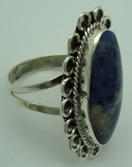 Oval ring with cord in flower with sodalite