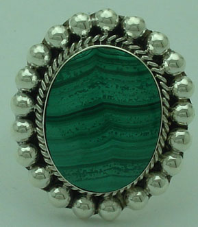 Oval ring with spheres and malachite