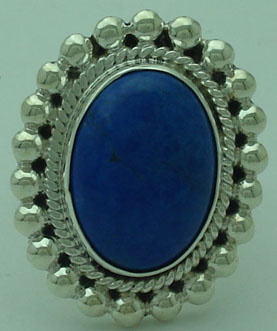 Oval ring with spheres and blue synthetic stone
