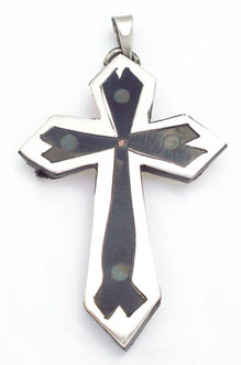 Pendant of cross of black resin and green