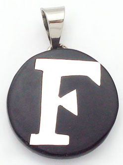 Pendant of black plastic with letter F