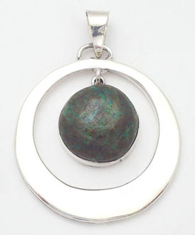 Pendant about circle perforated with Chrysocolla region