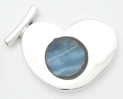 Pendant about heart with pearly resin smoothed round