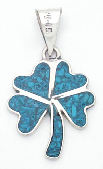 Pendant of clover of 4 leafs of blue resin