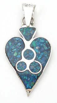 Pendant of heart of blue resin with three circles