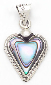 Pendant of shell heart with torsal