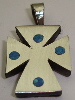 Pendant about cross mated with drops of recina turquoise