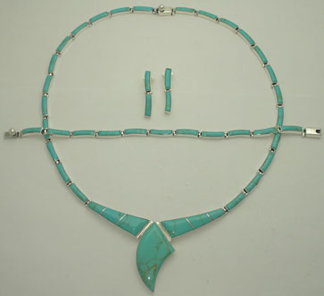 Set of bars of turquoise quitman with type canine tooth