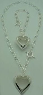 Set of bracelet and necklace of heart big dragged
