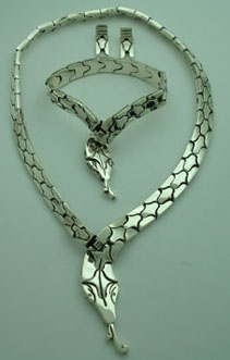 Set of snake necklace, earrings and bracelet