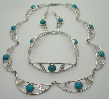 Necklace with  bracelet  and moons earrings with stones of synthetic turquoise