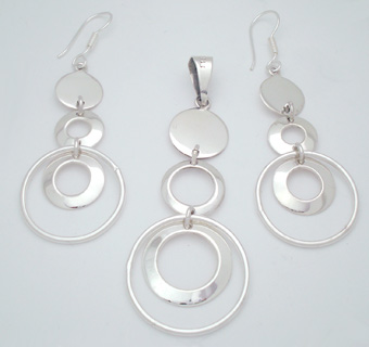 Earrings Set and Pendant  on smooth inserted circles