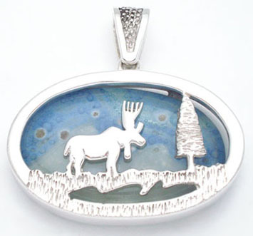 Pendant  on reindeer with pine in blown glass