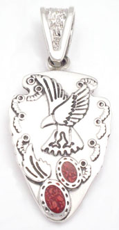 Pendant  on shield with drops of red resin and eagle