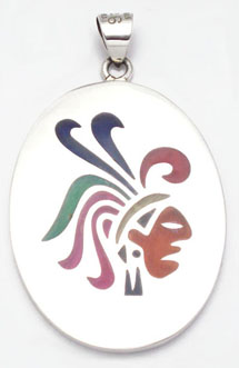 Pendant  on oval with Aztec in pen work with enamel